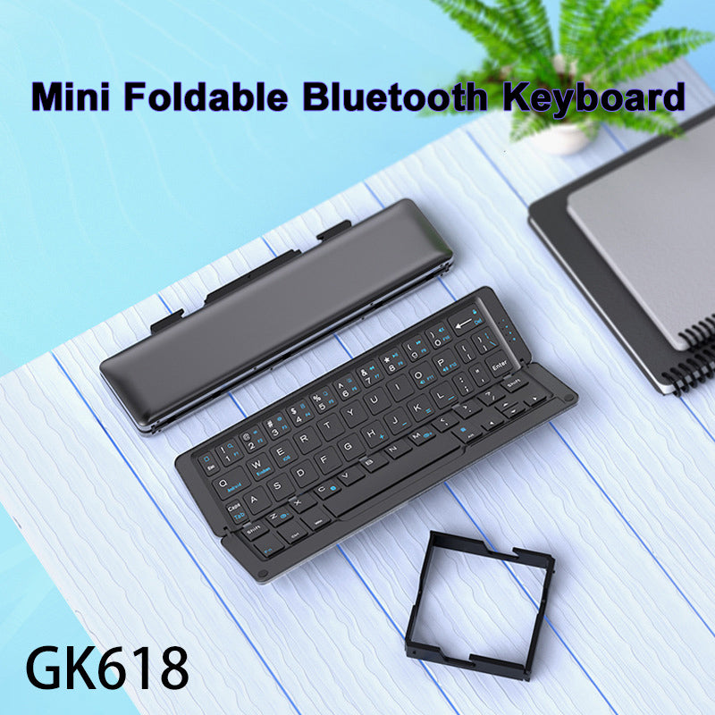 Portable foldable Bluetooth keyboard with built-in magnetic stand for iPad and smartphone