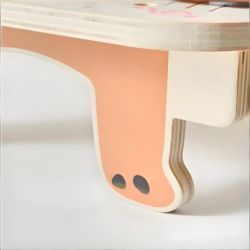 Child exploring piano keys on wooden Montessori musical toy