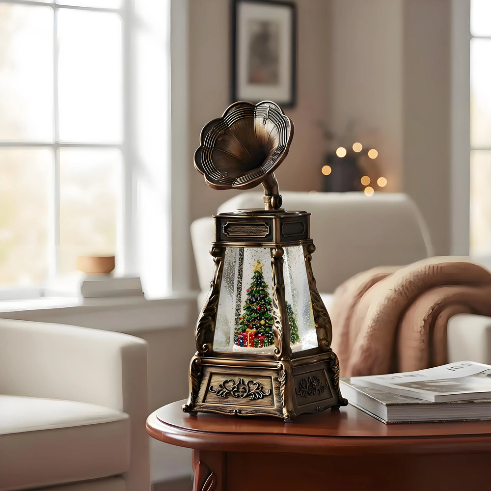 Musical phonograph snow globe playing classic Christmas songs with swirling snow effect.
