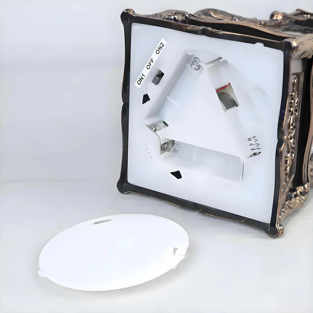 Musical phonograph snow globe showing glitter movement and warm light reflections.