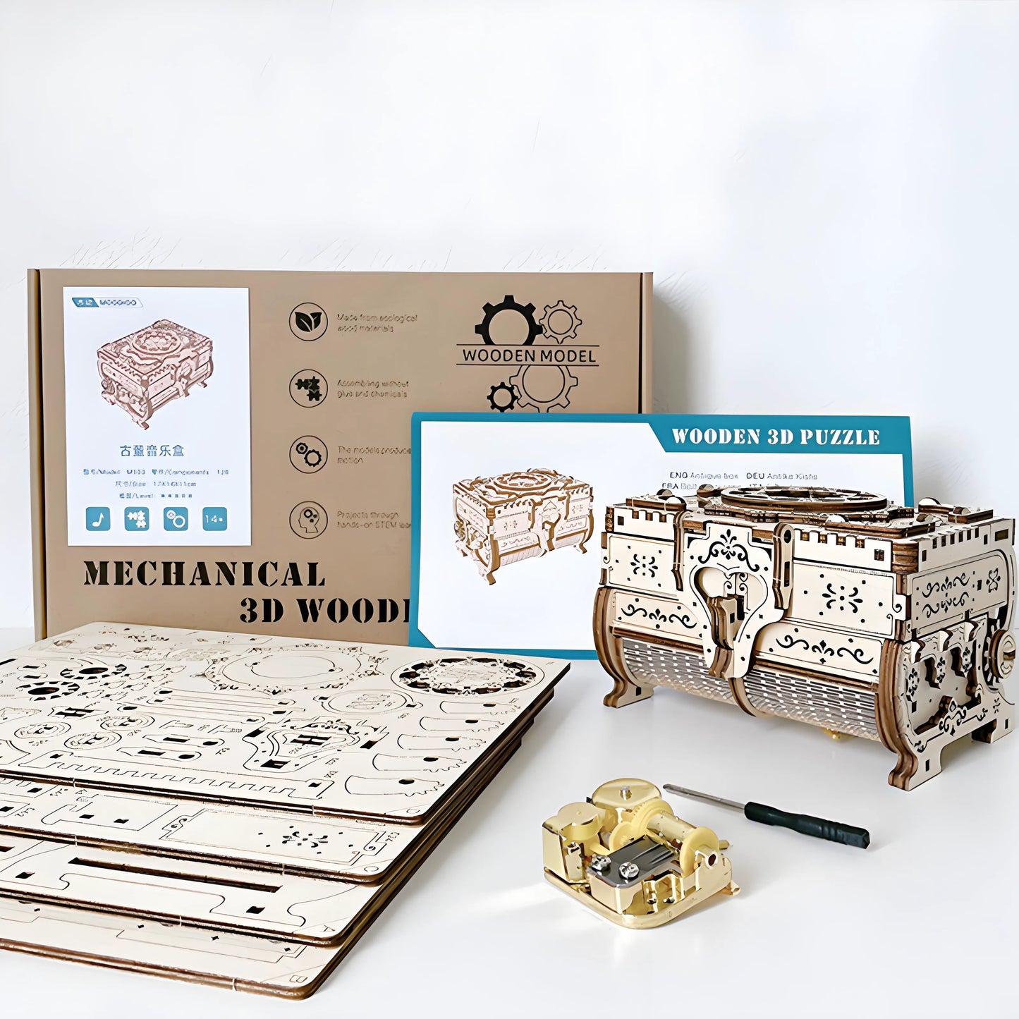 Wooden 3D puzzle set with packaging and tools on a white background