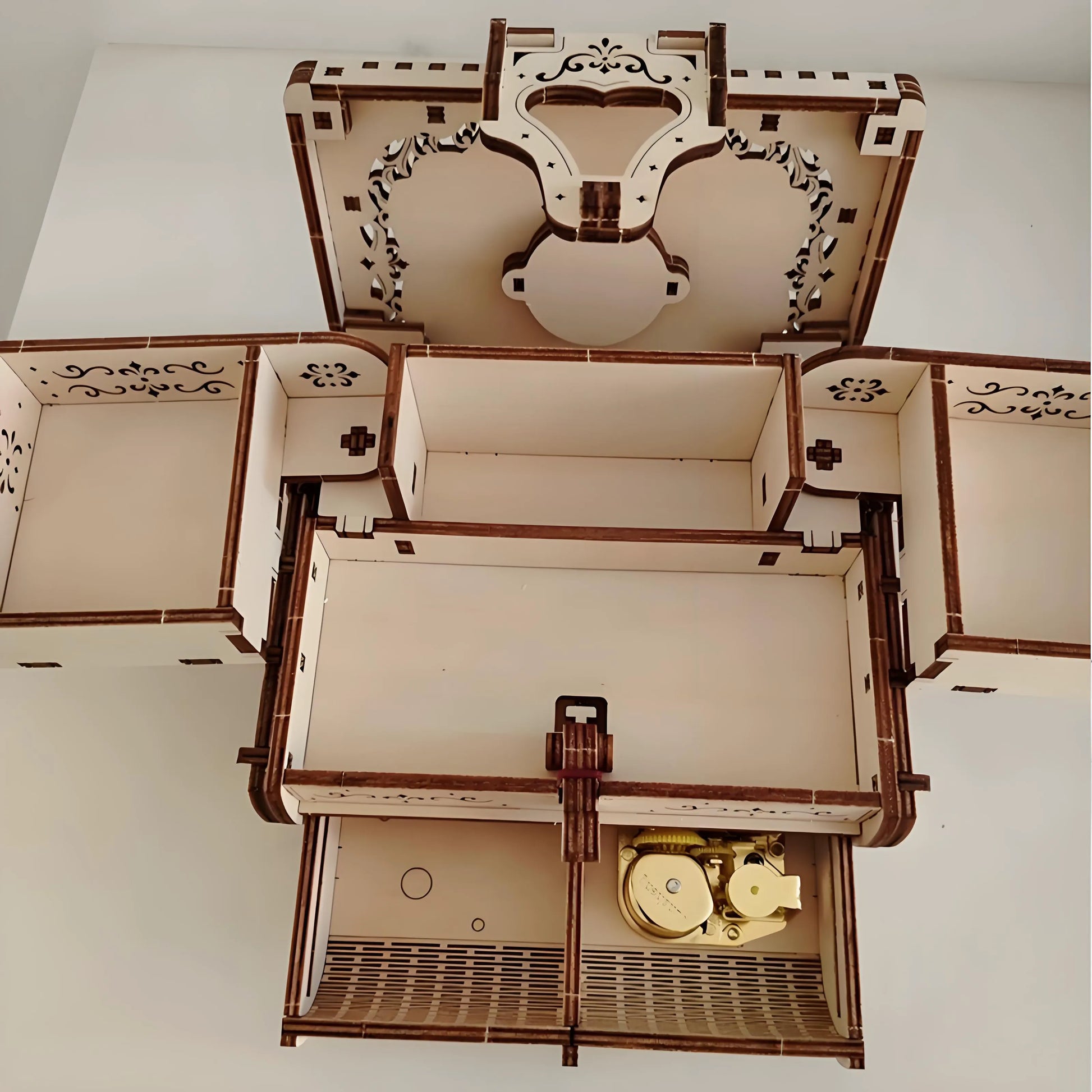 DIY Mechanical Music Box Puzzle Jewelry Box made of laser-cut linden wood, showing hidden compartments and spring-powered 18-note music movement, perfect for DIY craft lovers and gift-giving.