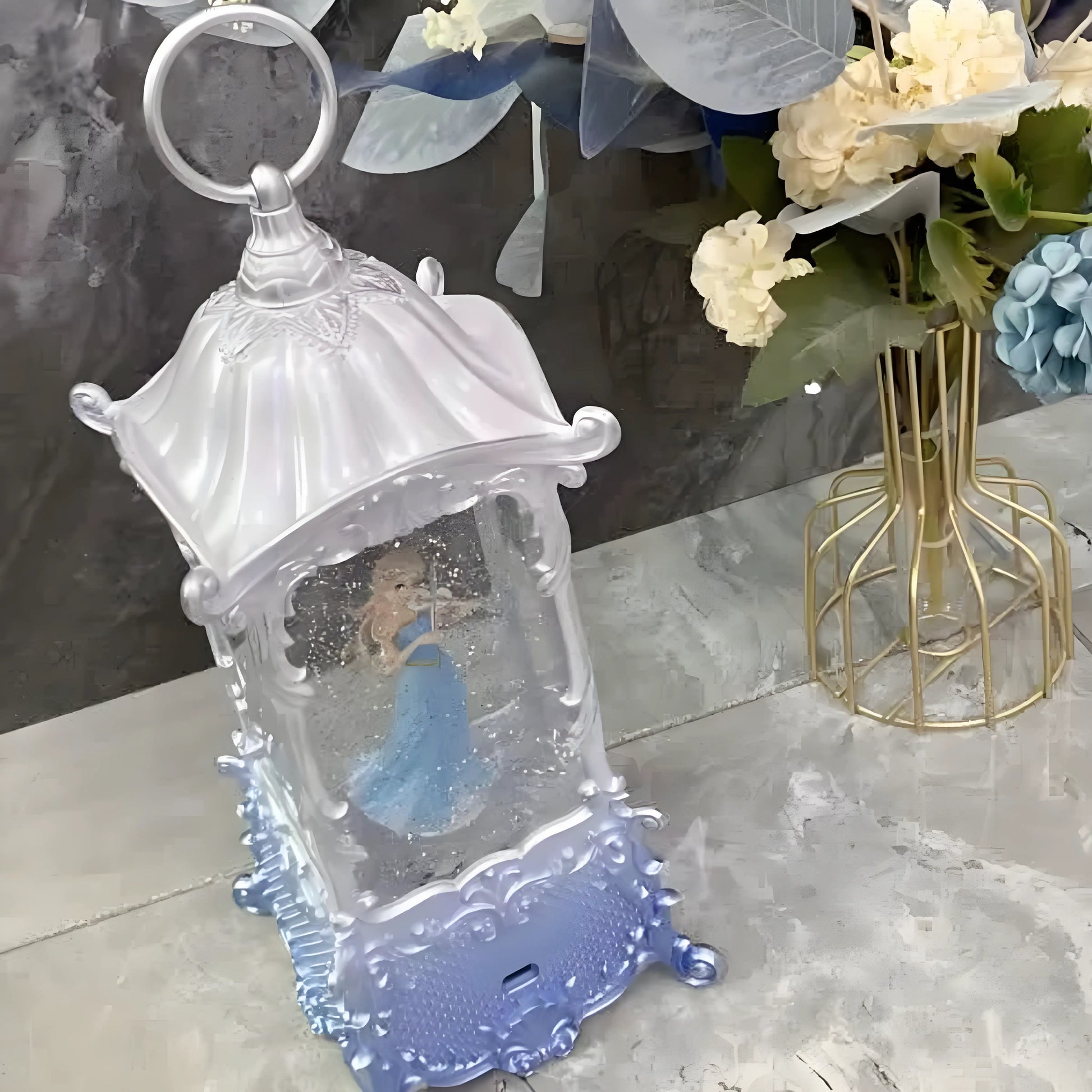 Side view of the snow globe showing polyethylene body and clear liquid dome