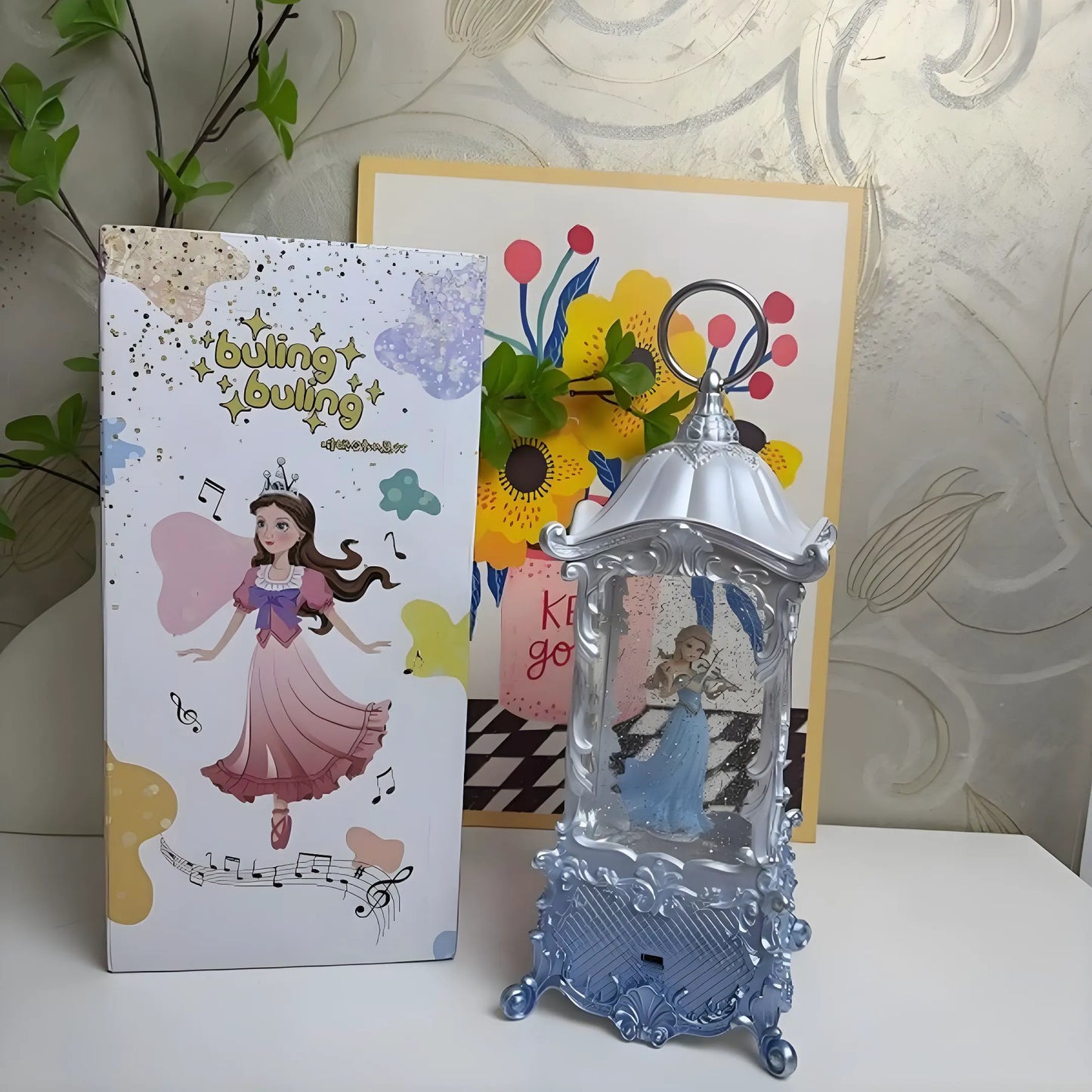 USB and battery dual-power princess snow globe music box on a bedside table