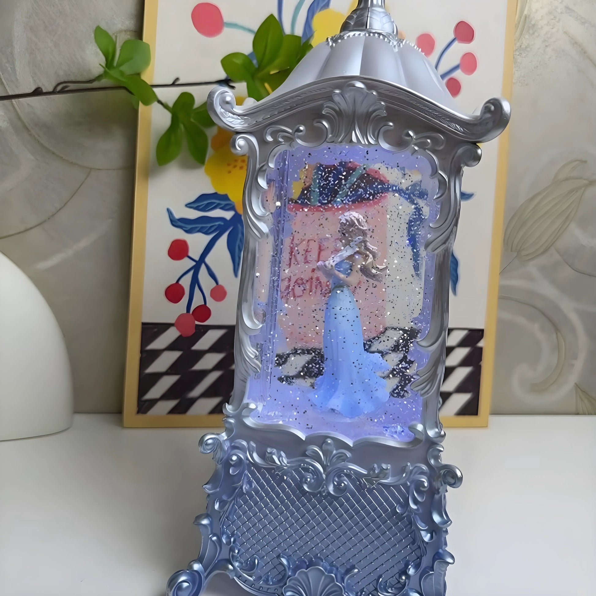Princess snow globe music box with swirling glitter and soft warm lighting