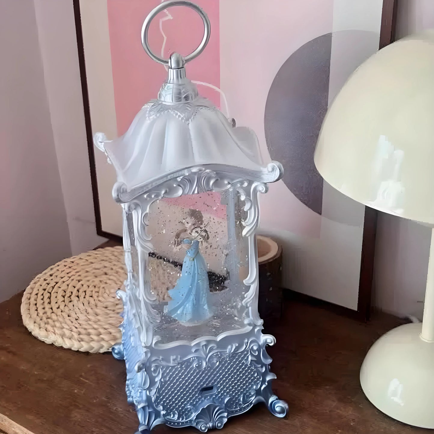 Top view of the elegant snow globe showing detailed princess figure