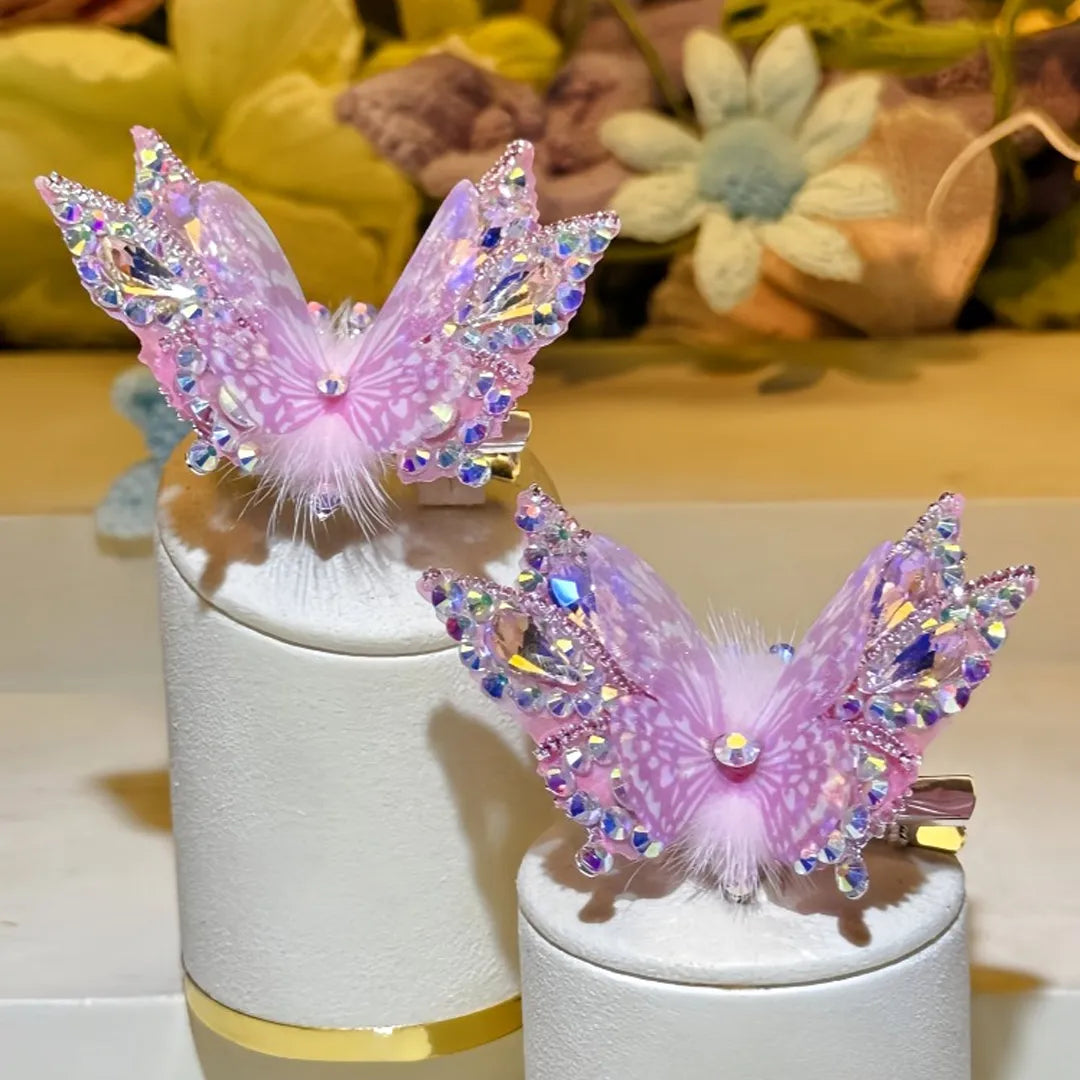 Butterfly hair clip with spring-activated wings gently flapping to create a lively and magical look