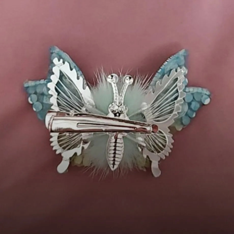 Elegant yet playful butterfly hair clip perfect for parties weddings and special occasions