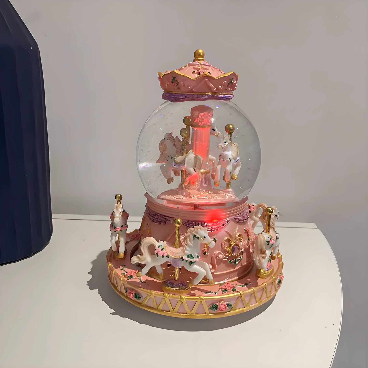 Magical LED nightlight effect with glitter inside snow globe