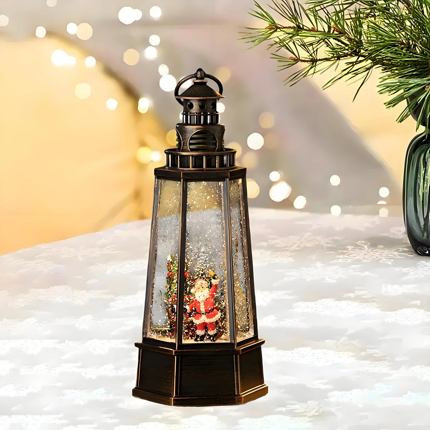 Vintage lighthouse-style musical snow globe lantern featuring a hand-painted Santa Claus carrying a green gift bag next to a decorated Christmas tree.