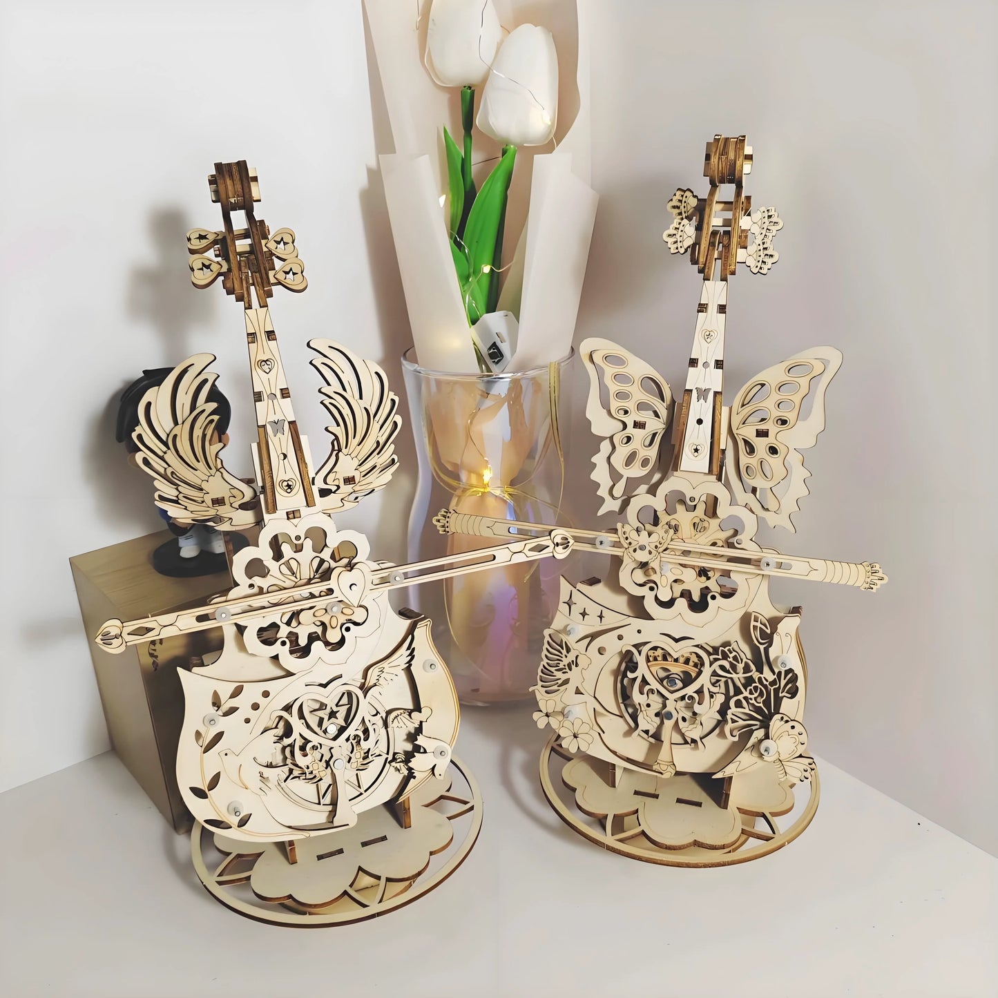 Wind‑up mechanical movement inside the wooden cello music box – no batteries needed