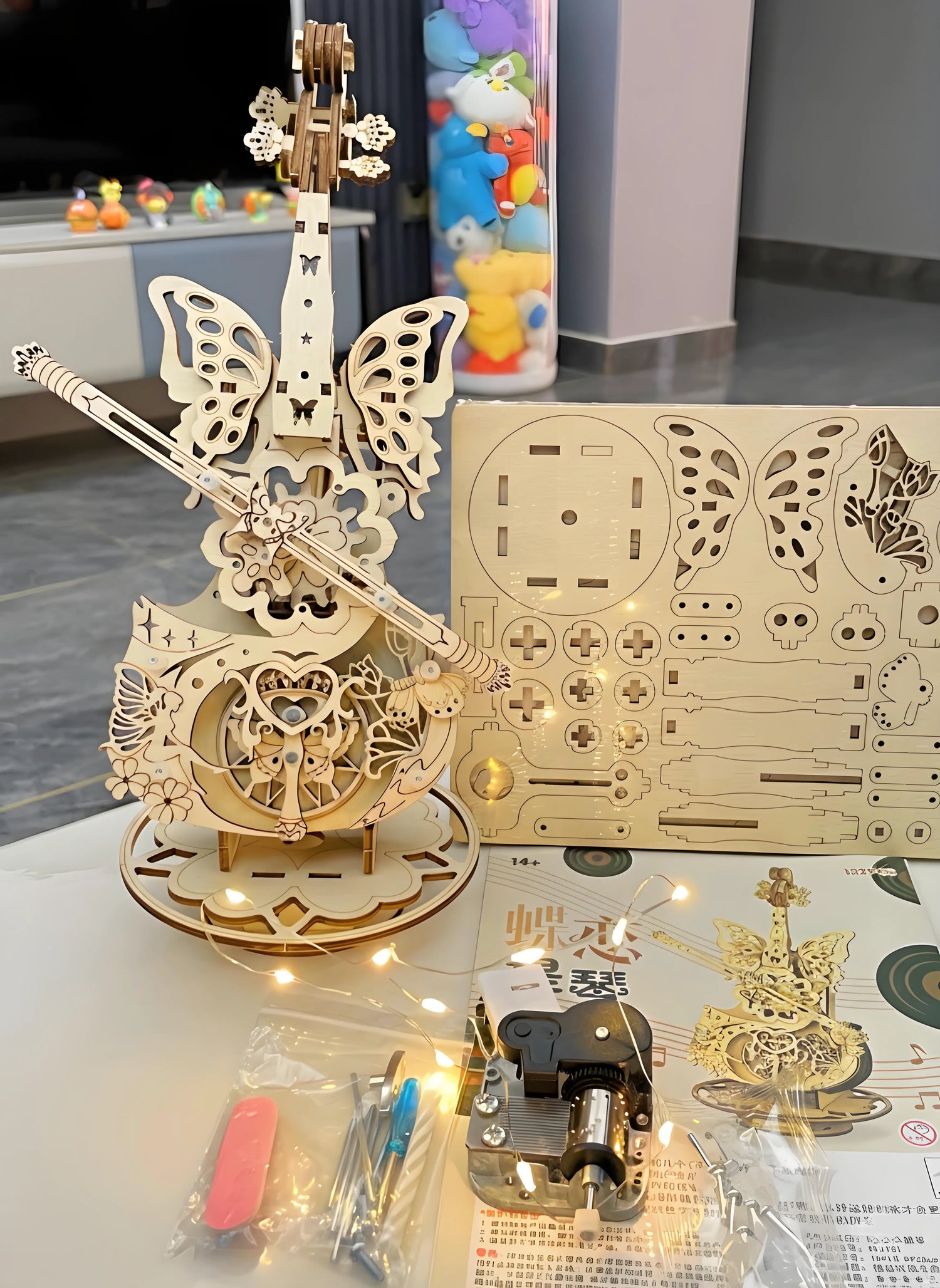 Close‑up of natural linden wood texture on cello body from the DIY music box kit