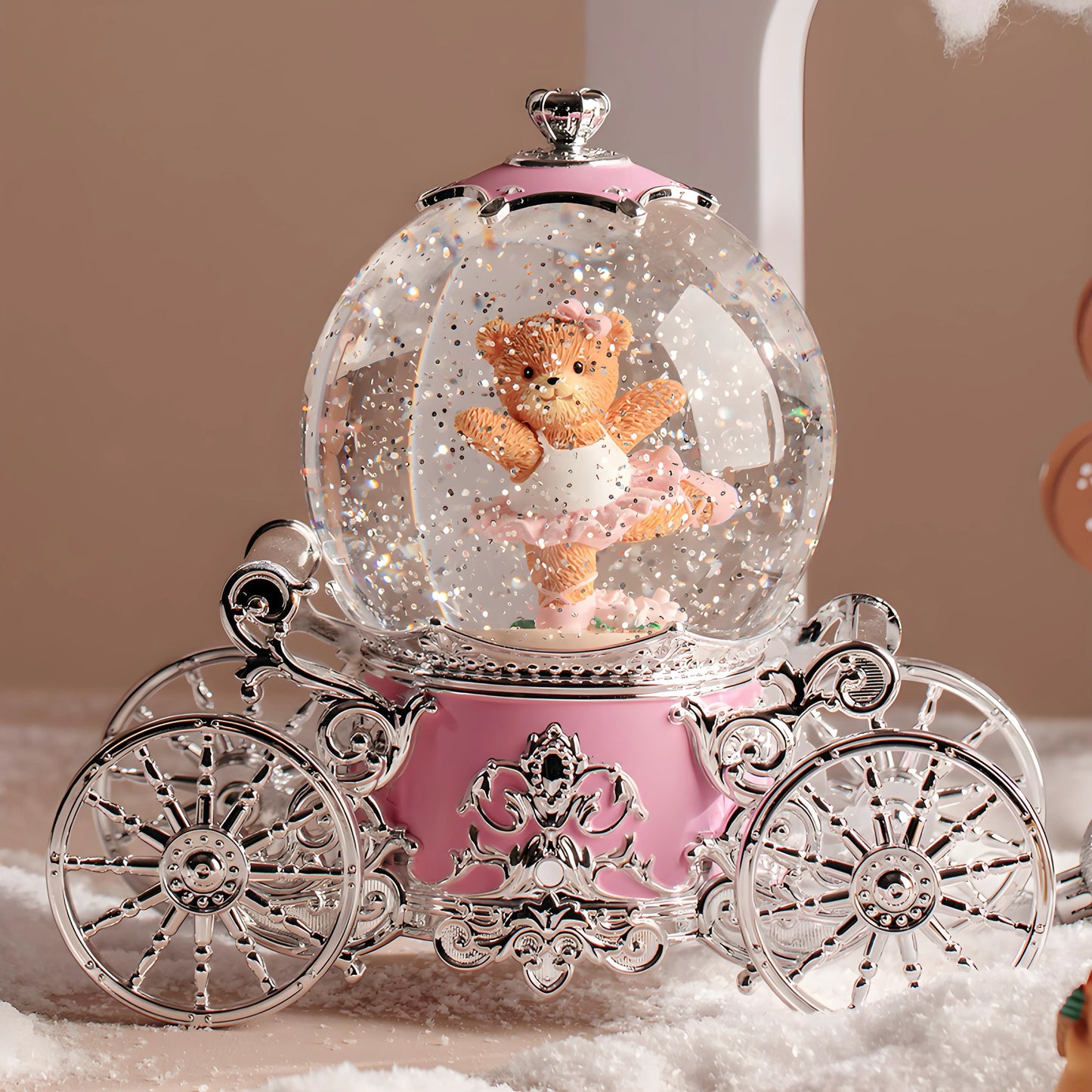 Musical snow globe pumpkin carriage displayed as birthday and holiday gift idea