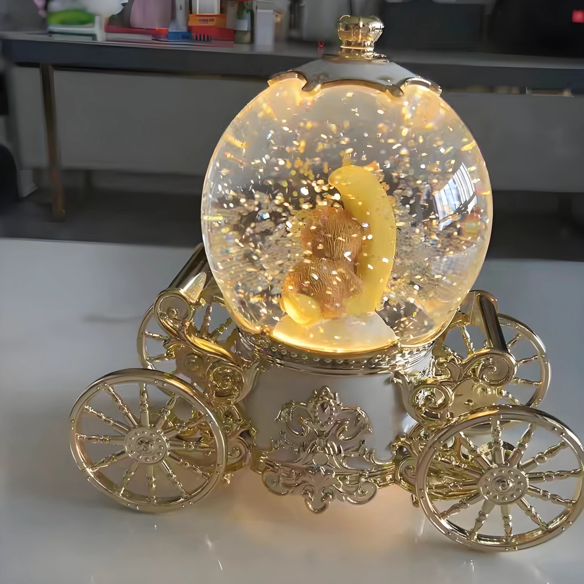 Collectible pumpkin carriage musical snow globe with fairytale princess-style design