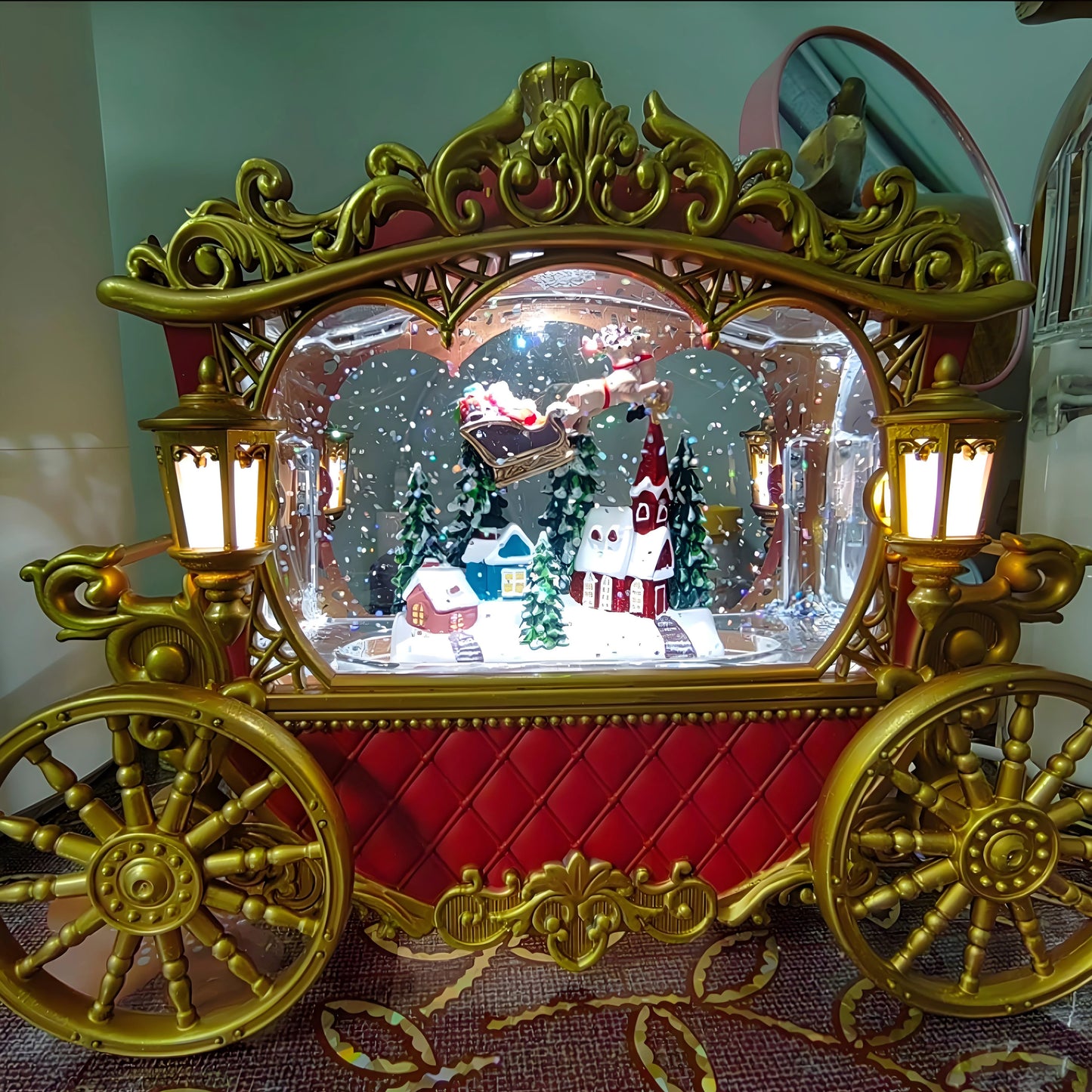 Soft LED illumination highlighting the carriage and snow inside the globe