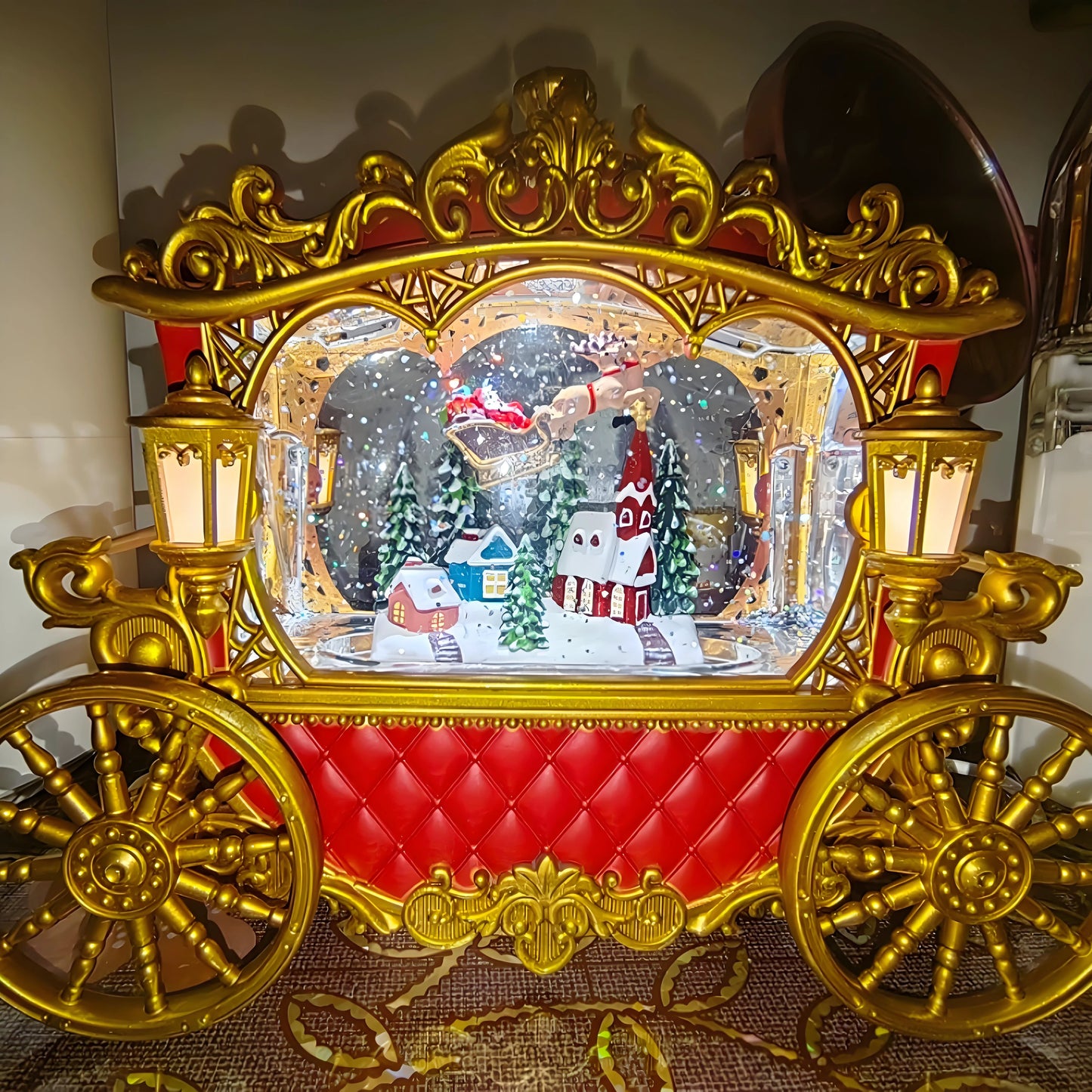 USB and battery powered Christmas carriage snow globe on mantel