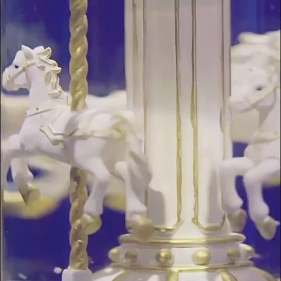 Pink Carousel Musical Snow Globe with rotating horses and LED light