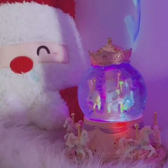 Elegant pink and gold carousel music box for birthday or holiday gifts