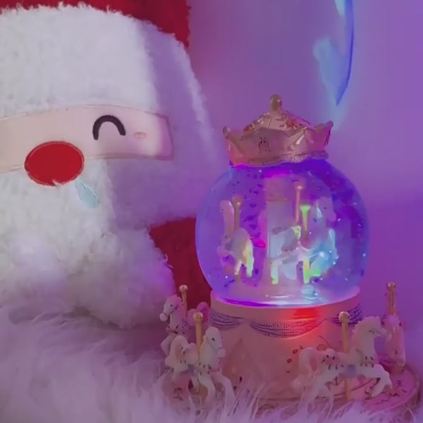 Elegant pink and gold carousel music box for birthday or holiday gifts