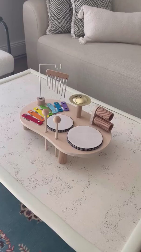 Parent and child bonding through music using a wooden percussion toy